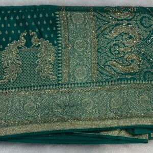 Teal green designer saree with golden zari work